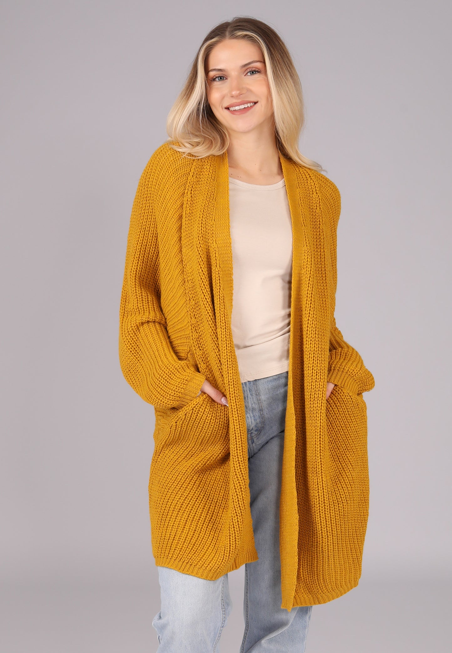 "Vielseitige One-Size Strickjacke in Senfgelb mit Taschen "