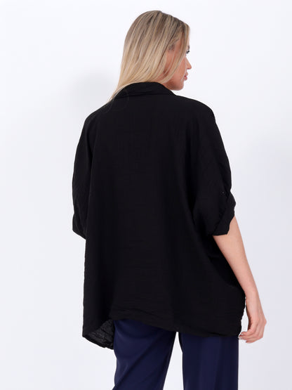 Weite Damenbluse aus 100 % Viskose mit Knopfleiste